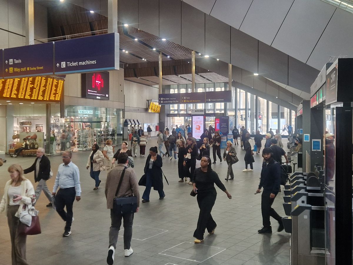 Morning commuters crossing the London Bridge station concourse